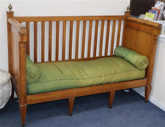 A Biedermier (?) cherry lathe back settee W.164cm